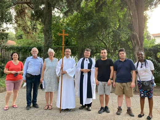 A group gathered before the Feast of St Mary.
