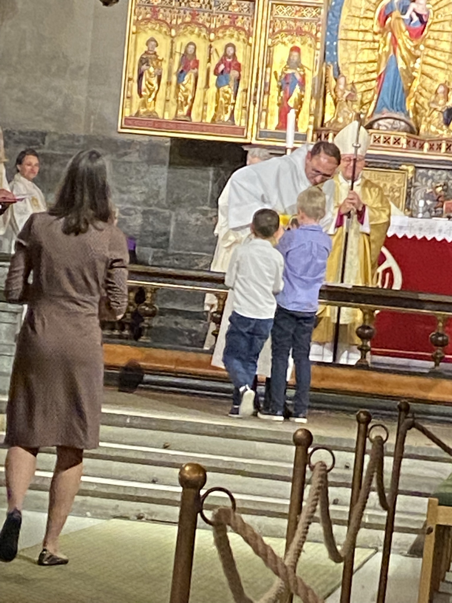 A priest giving blessings.