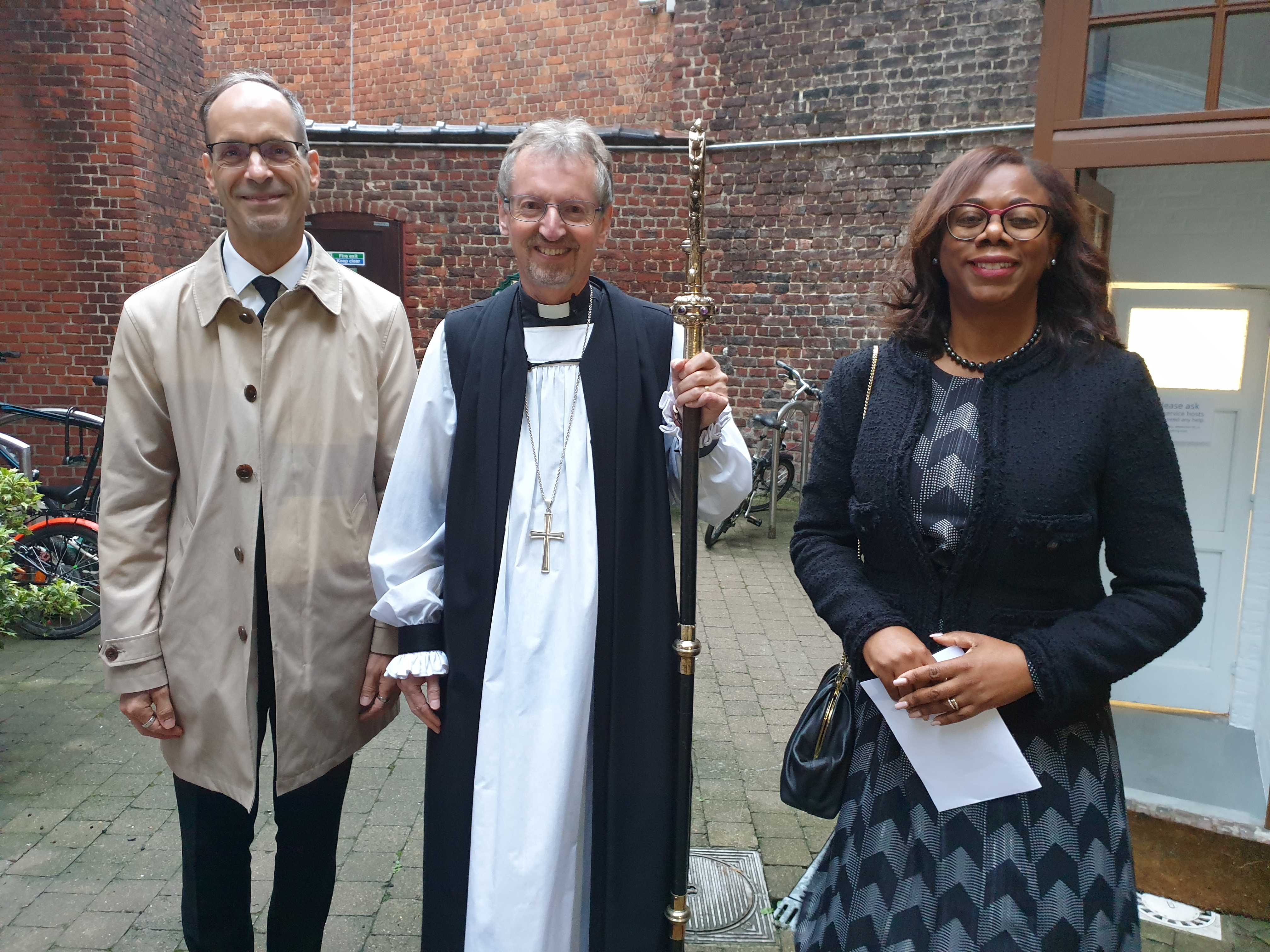 Bishop robert and others at a memorial service for the Queen.