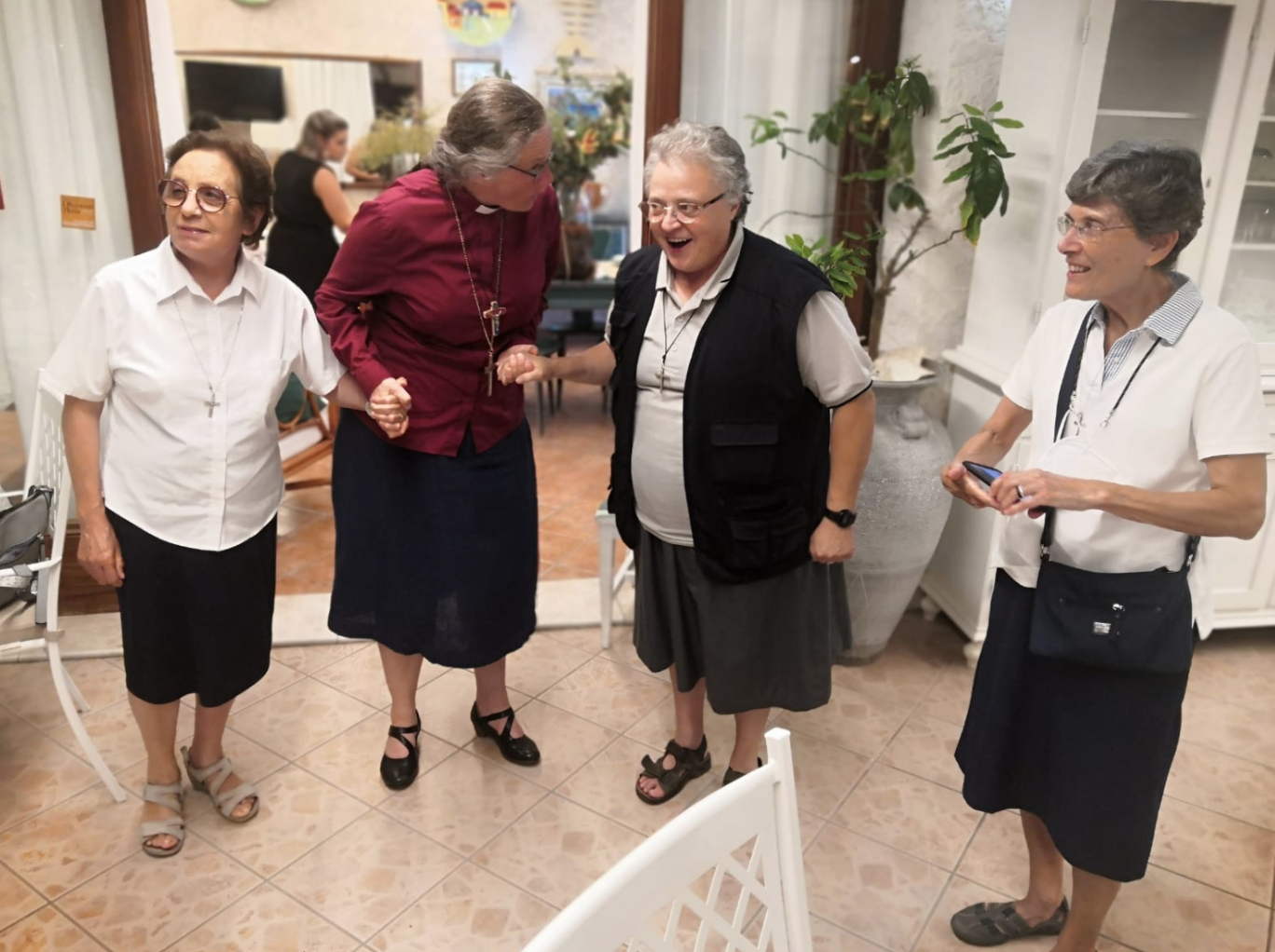 Four elderly clergy members.