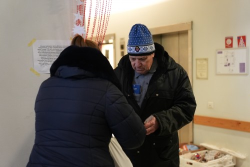 A refugee being helped.