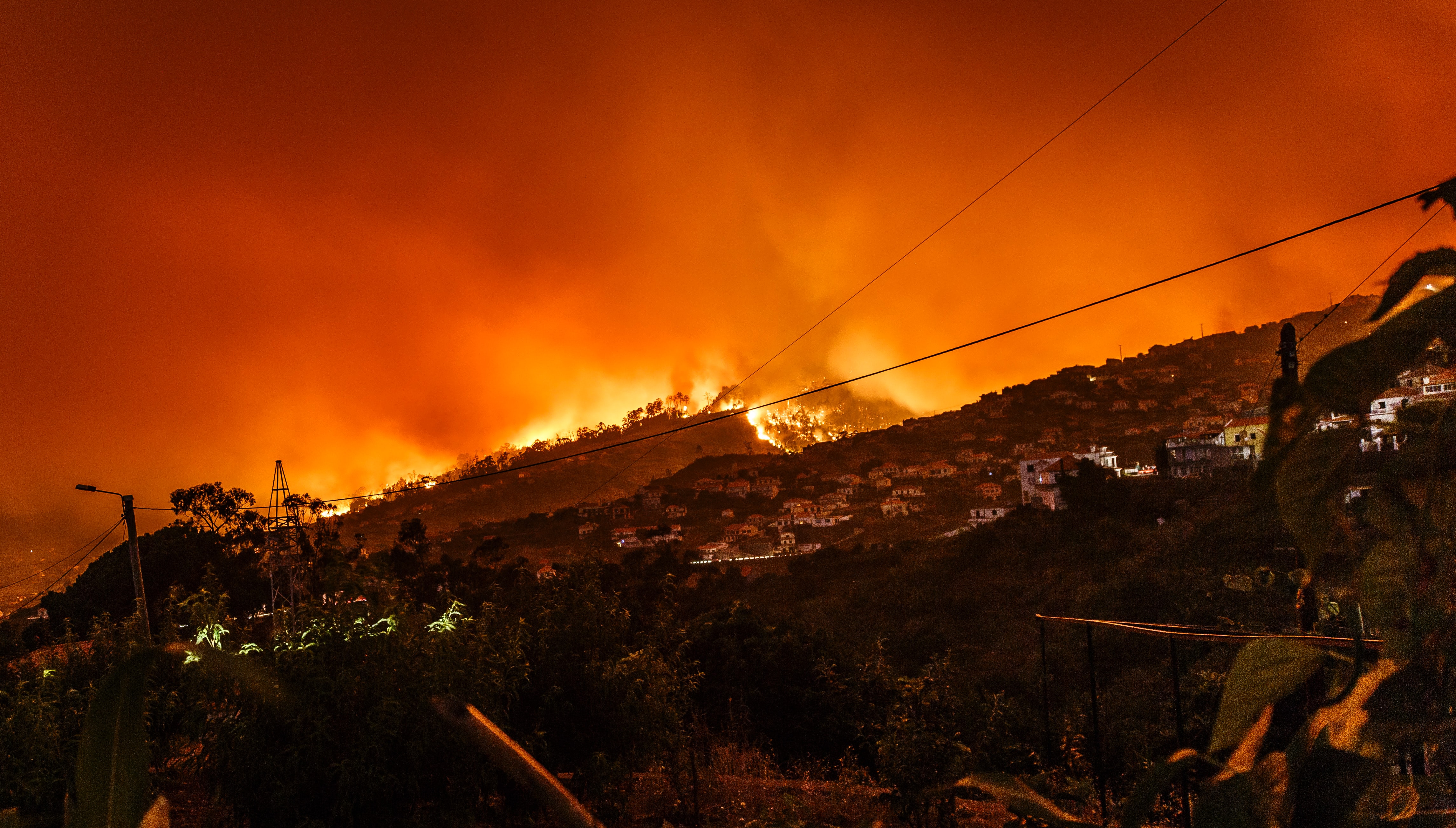 Fire raging on in the distance.