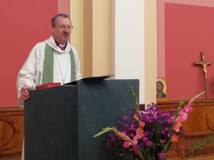 Bishop Robert giving a service.