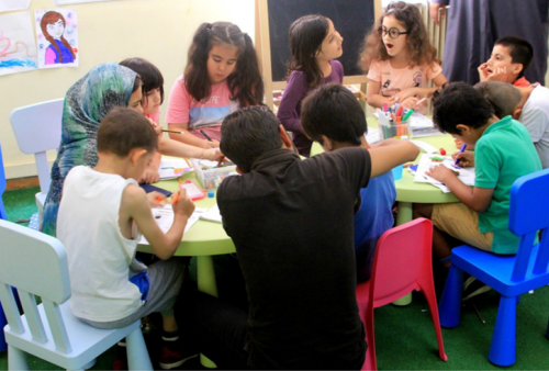 Children colouring together.