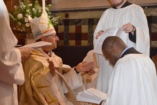 Bishop Robert performing a blessing.