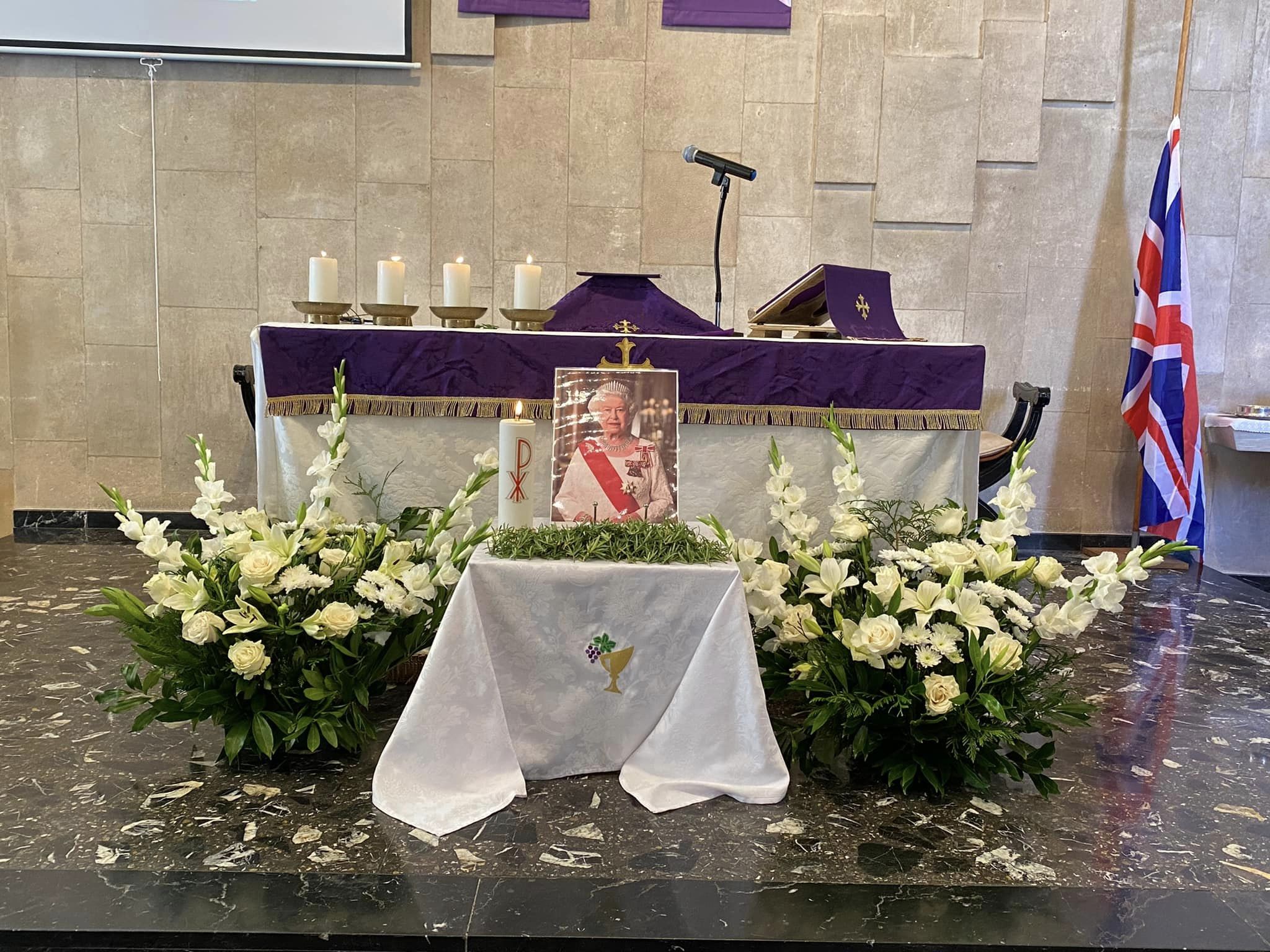 An altar set in remembrance of the queen.