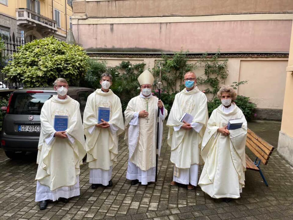 Clergy poses before an Ordination.