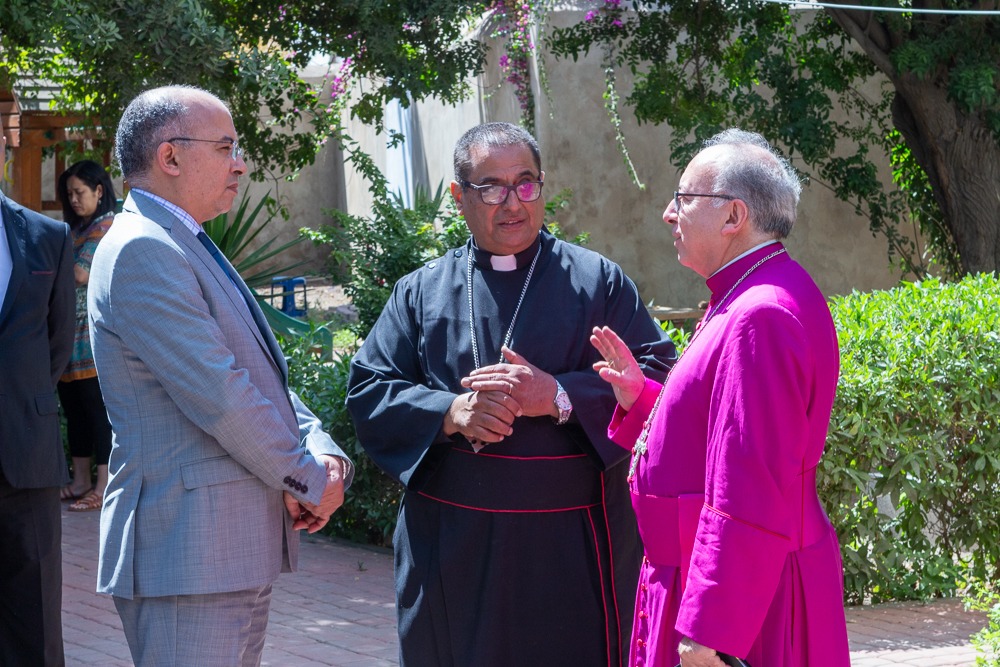 Clergy talking at St Johns.