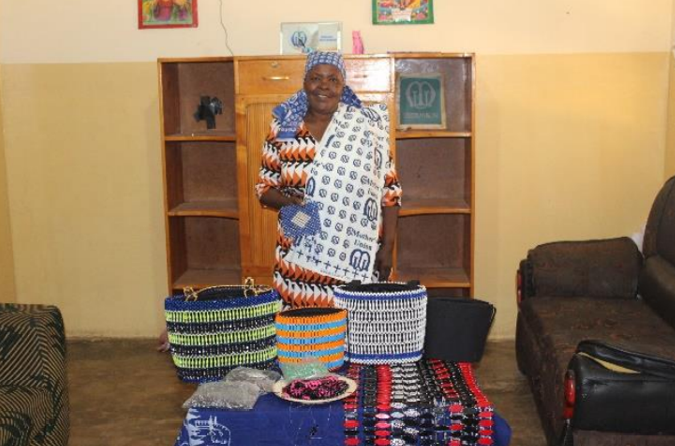 A tanzanian woman in colourful dress.