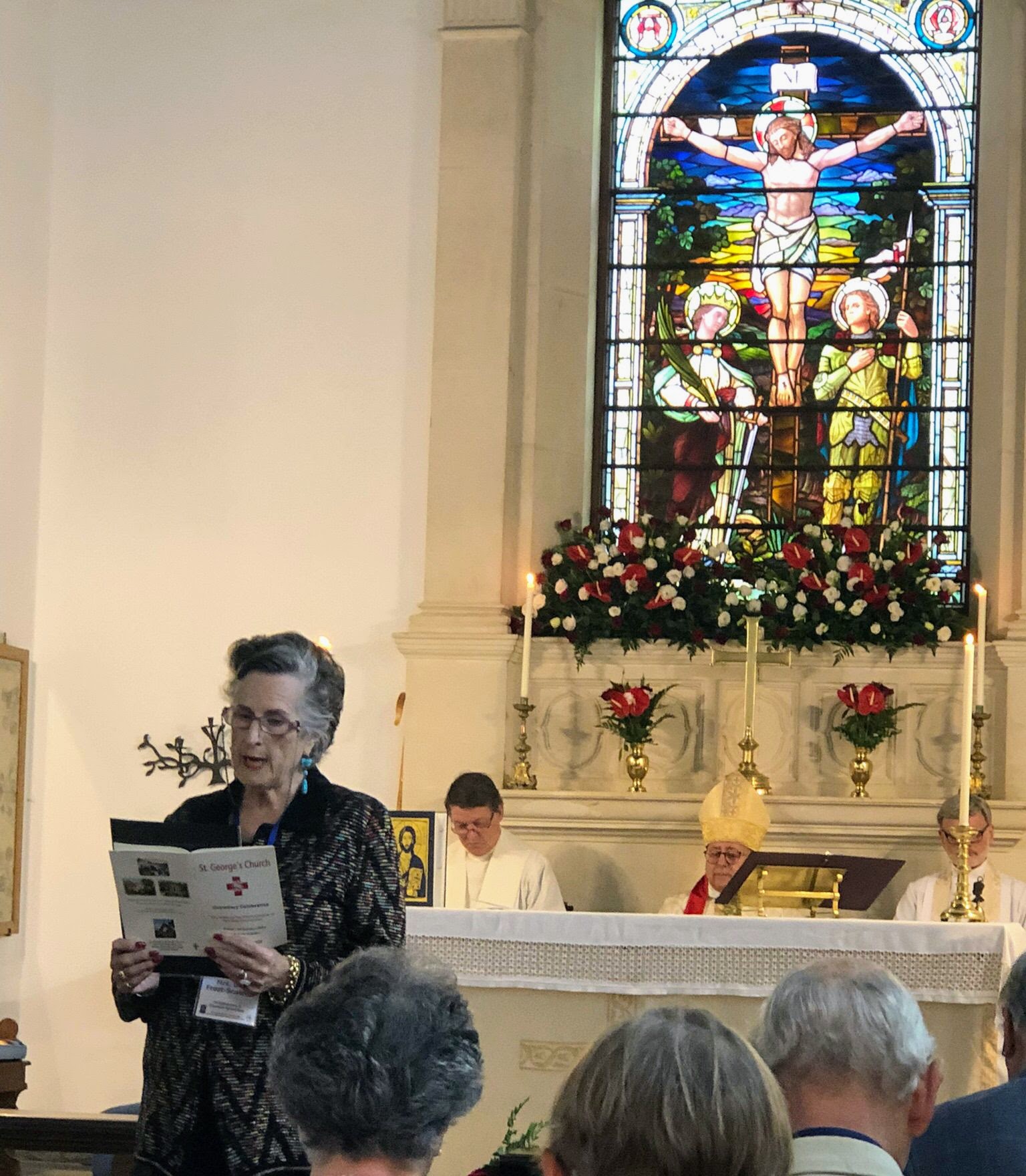 Mary Ann reading at the centenary.