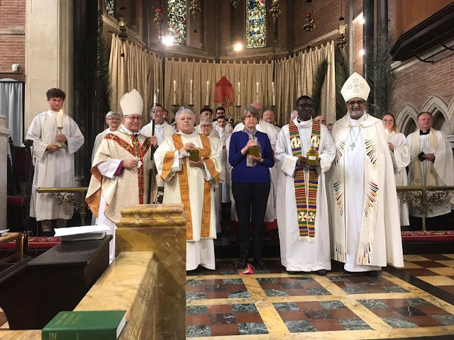 Clergy after the blessing of the oils.