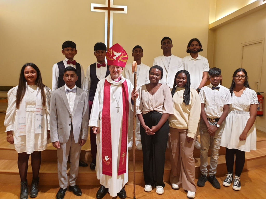 Bishop Robert with a group of young Christians.