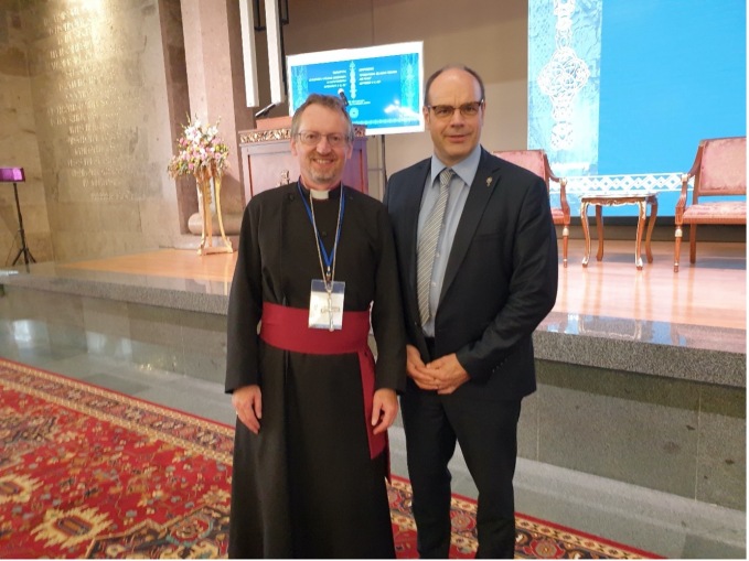 Bishop Robert and the Reverend Christian Krieger.