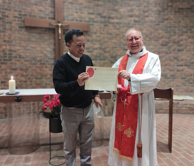 Father Nicolas being Liscensed.