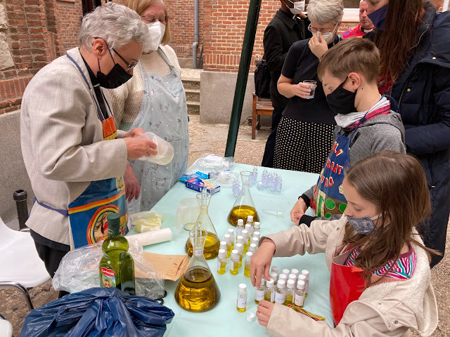 Congregation helping with the preparation of the Oils.