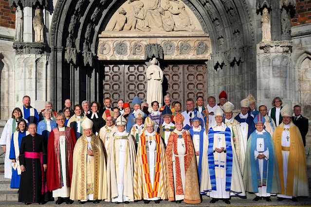 Clergy gathered at High Mass.