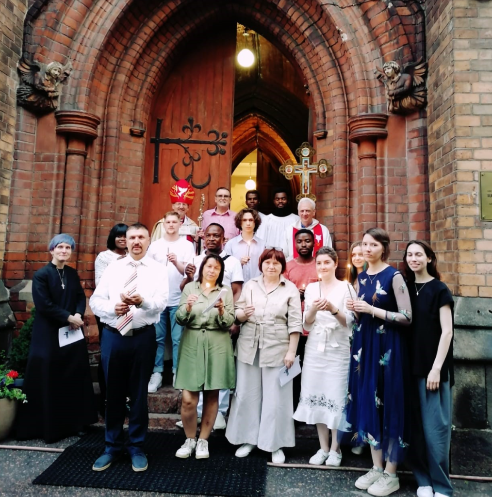 Bishop Robert outside St Andrews with the newly confirmed.