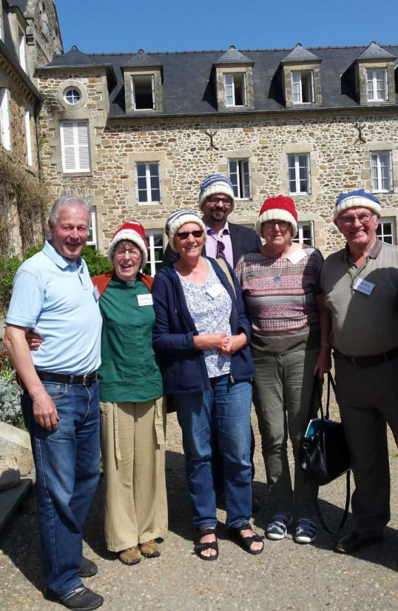 Seafarers wearing woolly hats.