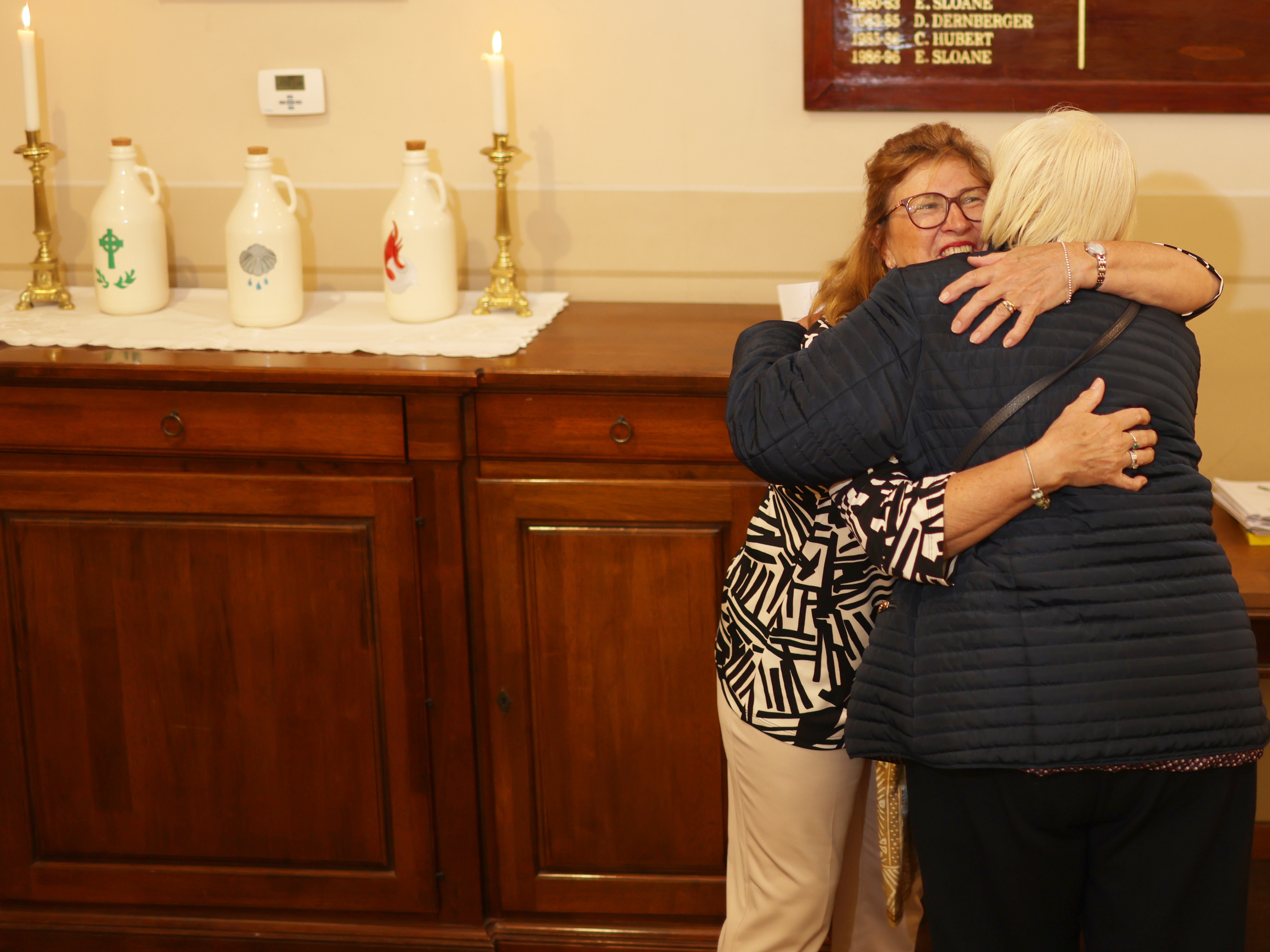 Congregation hugging