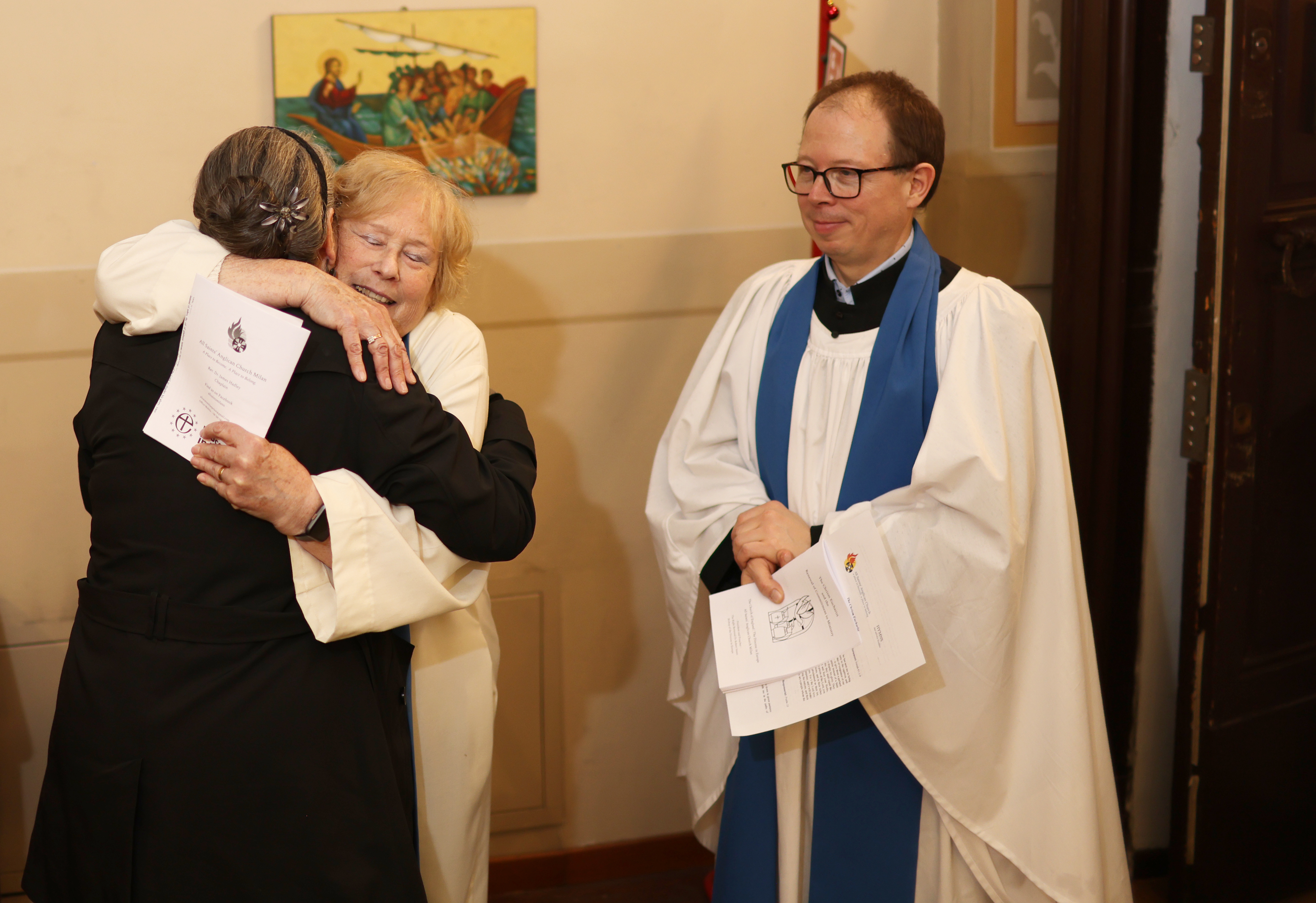 Congregation hugging