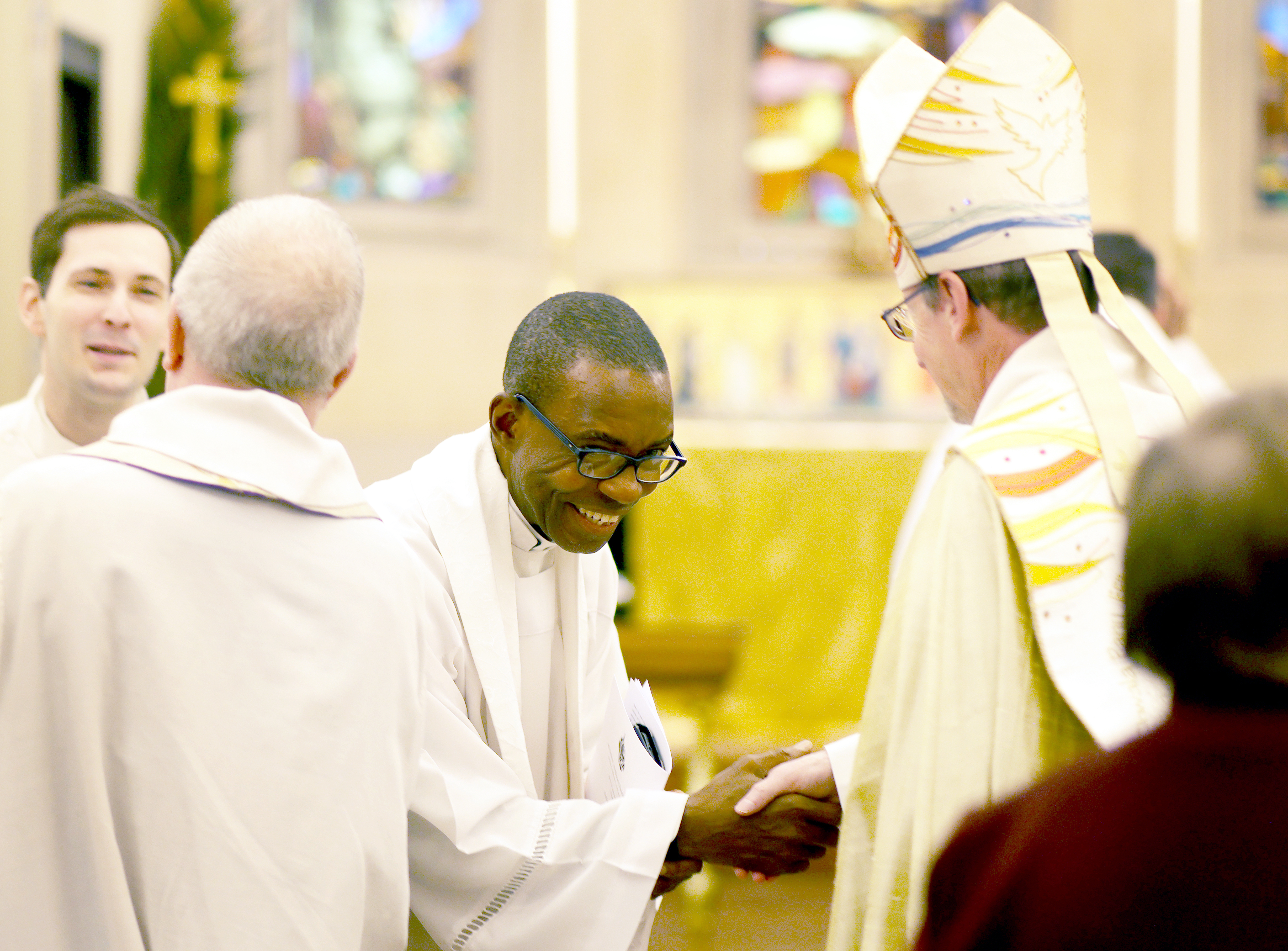 Bishop Robert greeting clergy