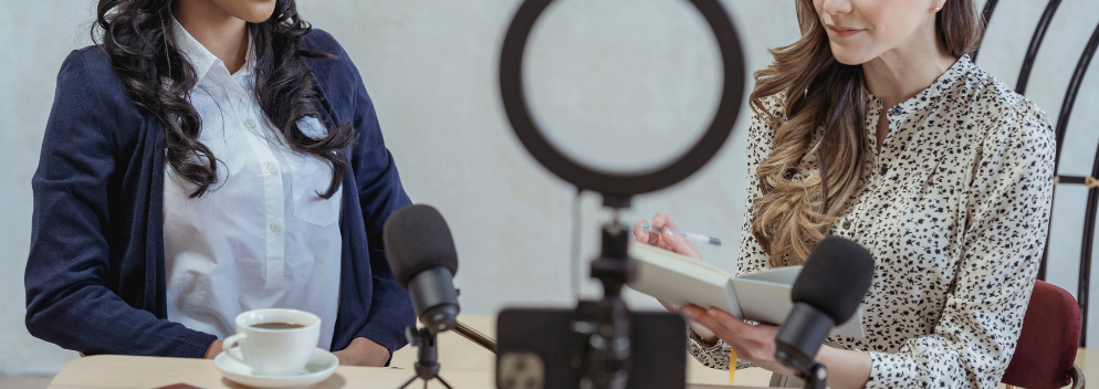 two people and a mic