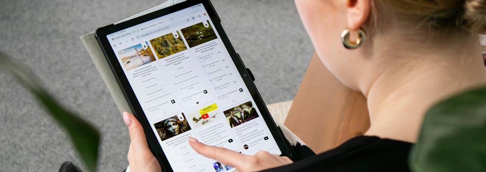 person looking at iPad