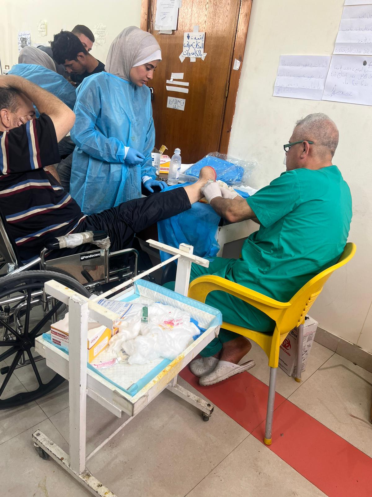 Nurse and patient in Gaza