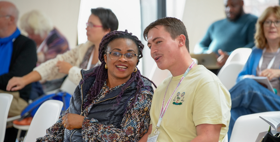 two young people talking