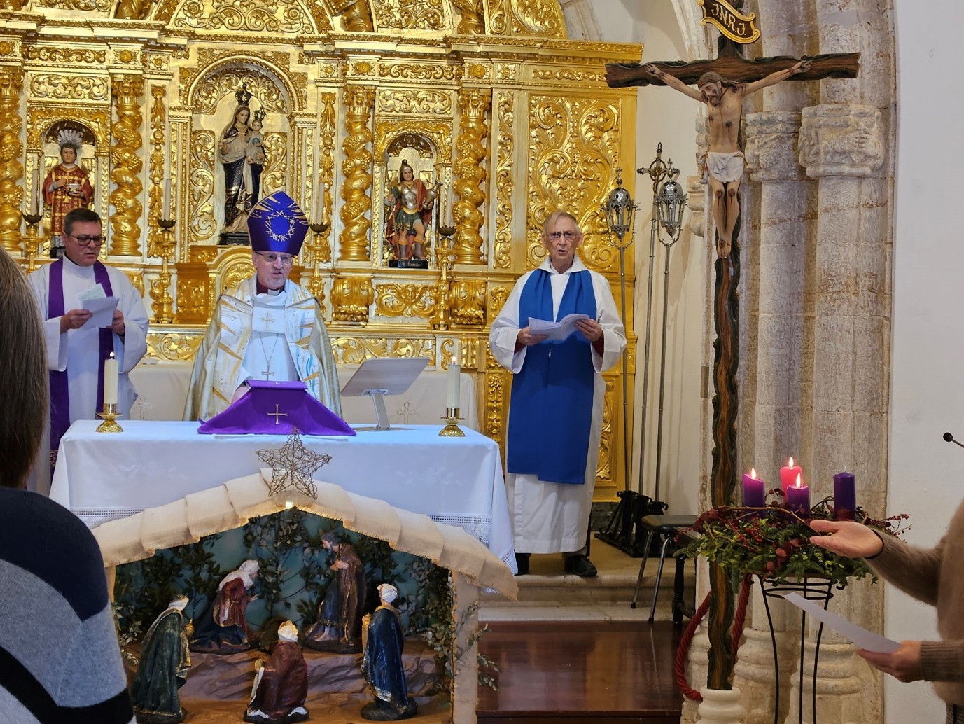 3 clergy at the altar