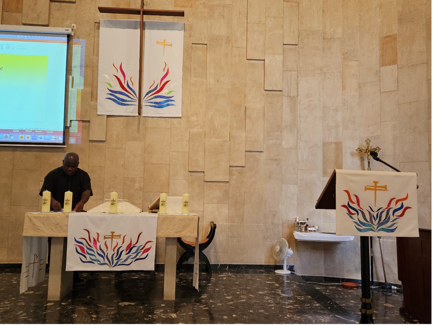 Chaplain behind altar
