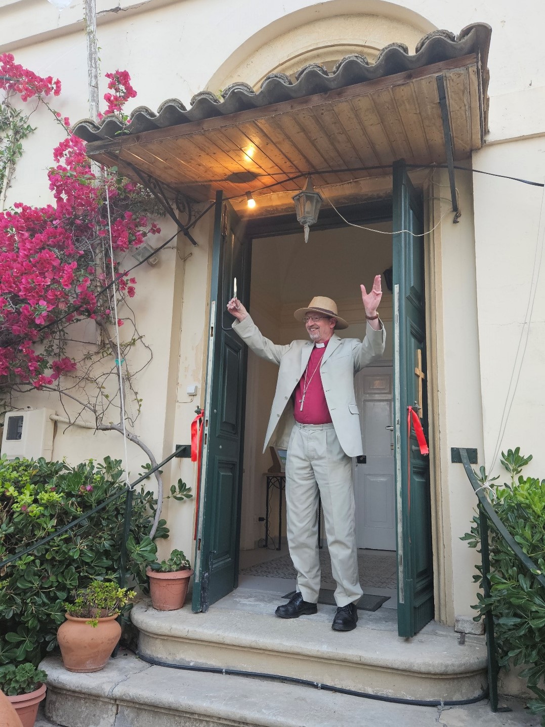 Bishop Robert opens Cafe Logos