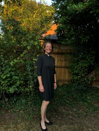 woman standing under a tree