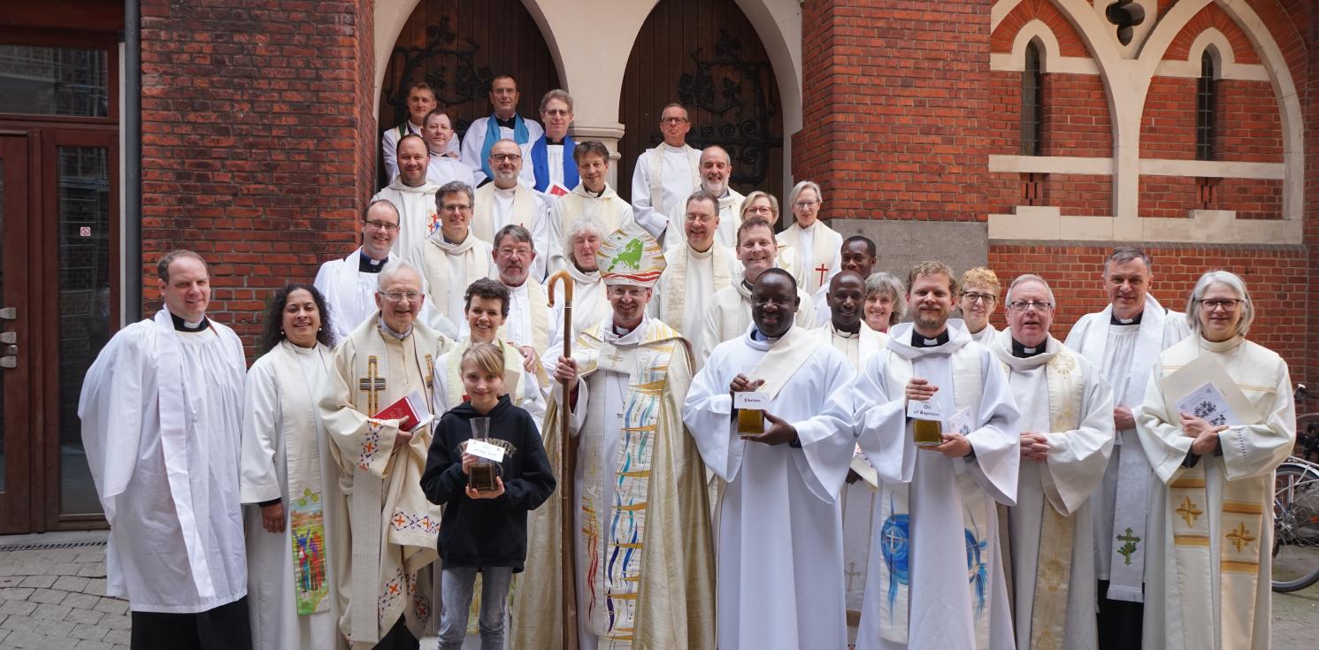 Clergy gathered after Chrism Eucharist.