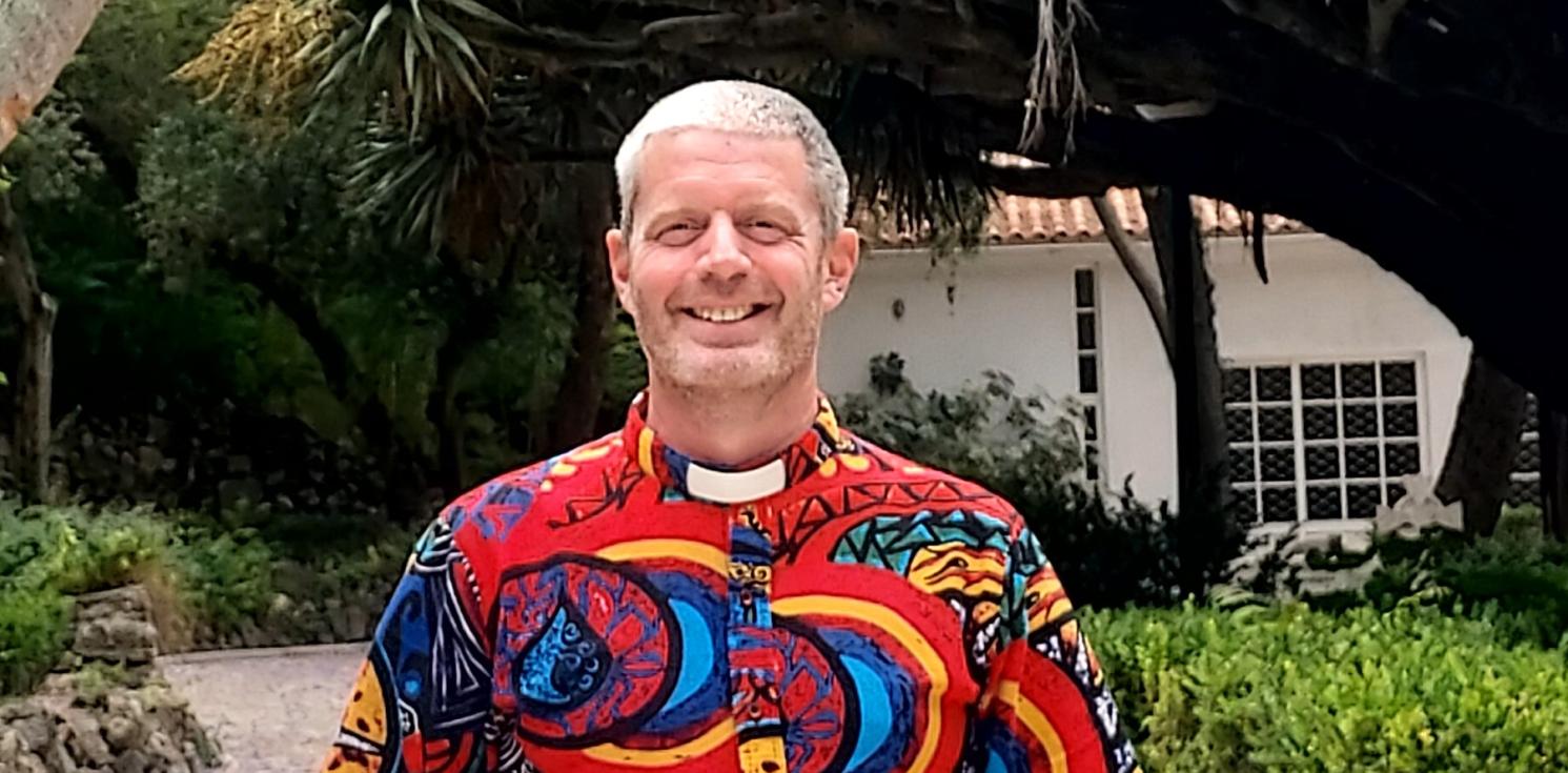 Ian in a bright shirt