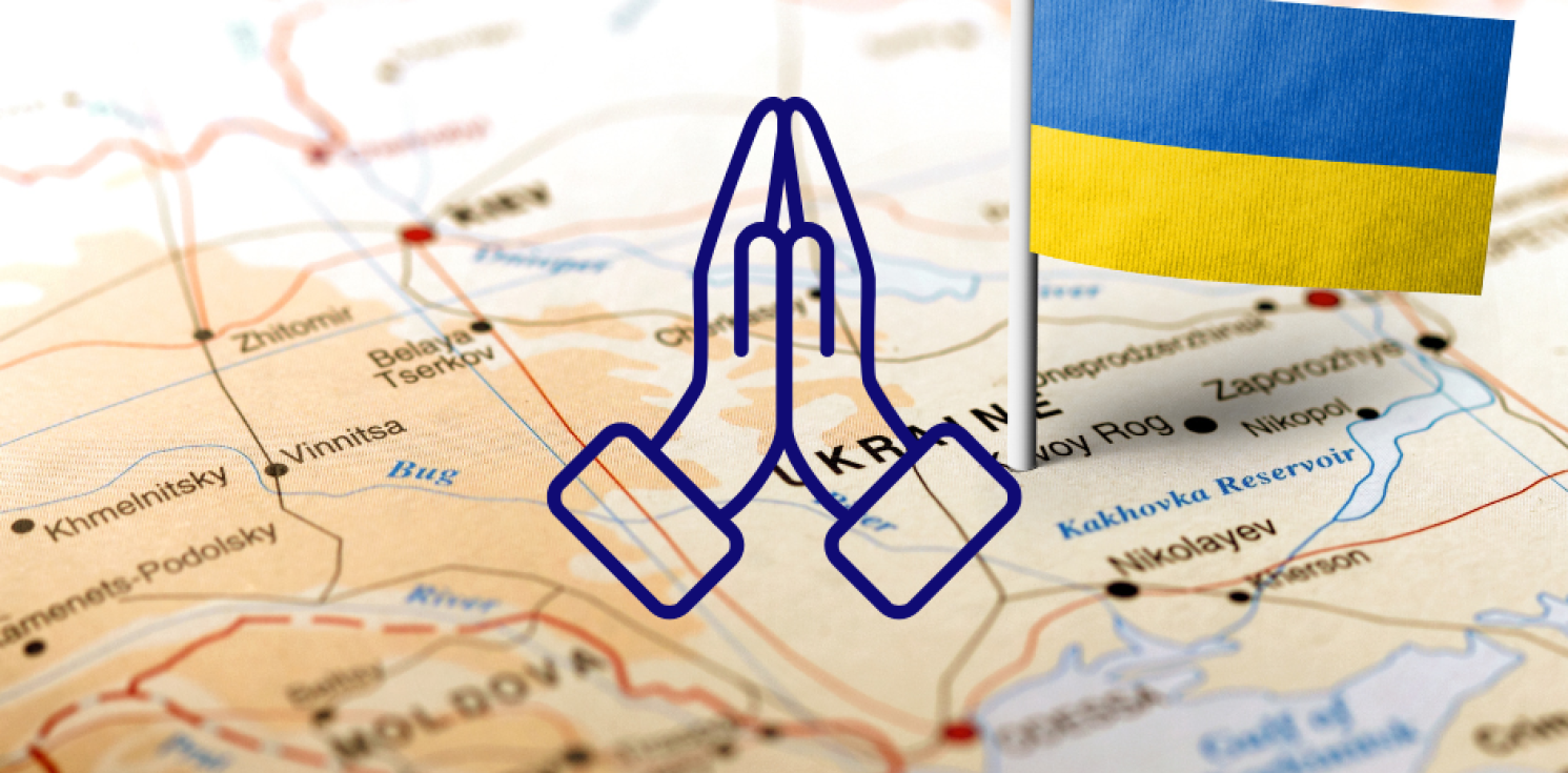 map of Ukraine with Ukraine flag and praying hands