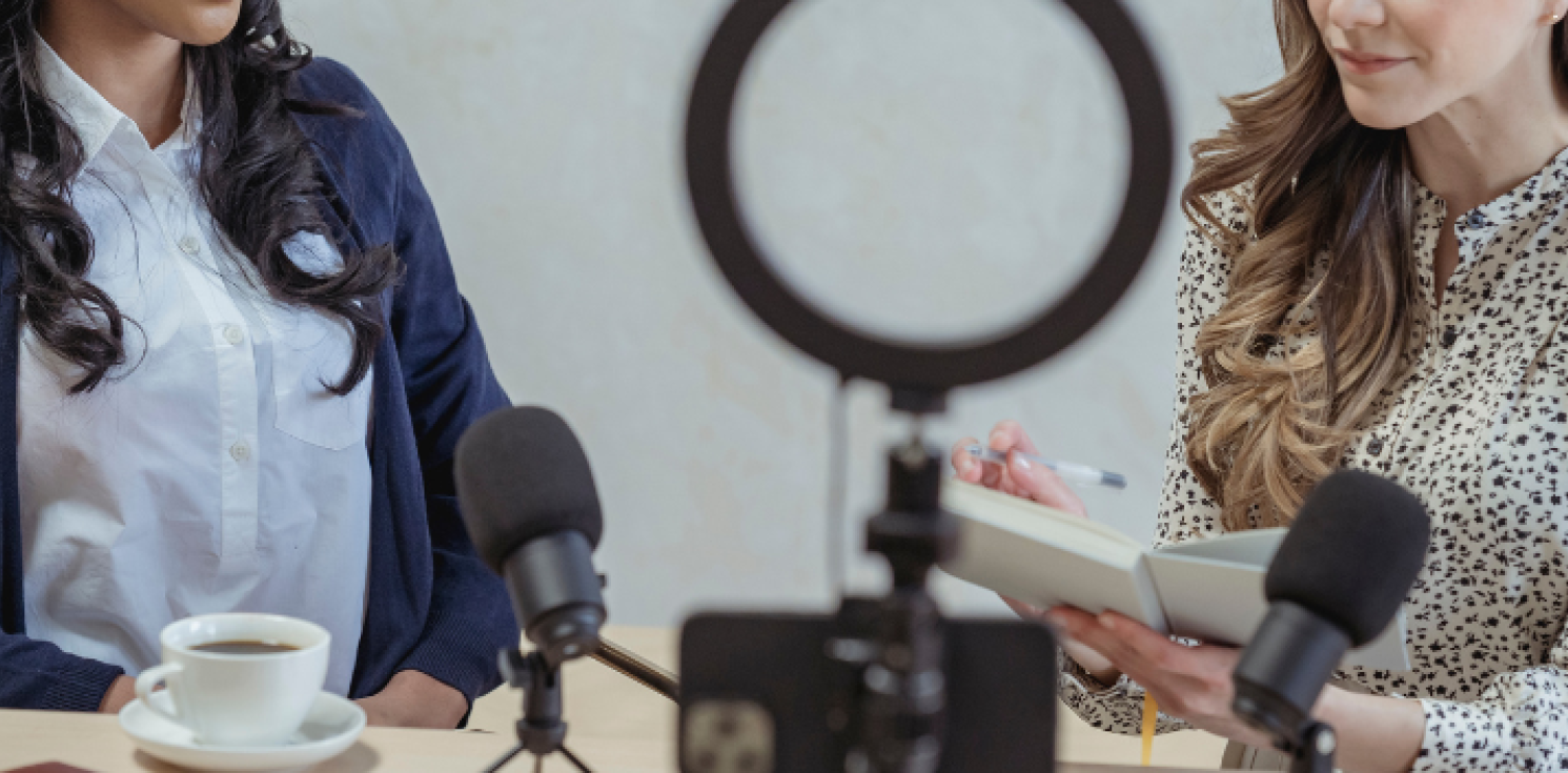 two people and a mic