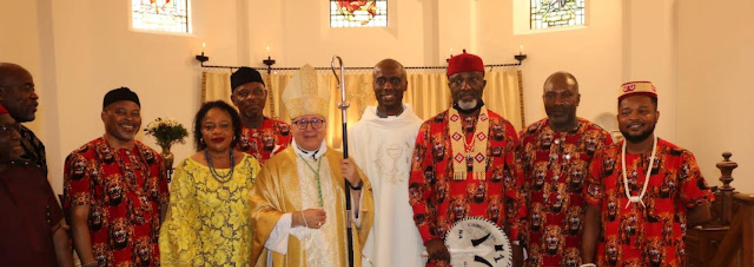 Bishop David, Father Solomon, and family.