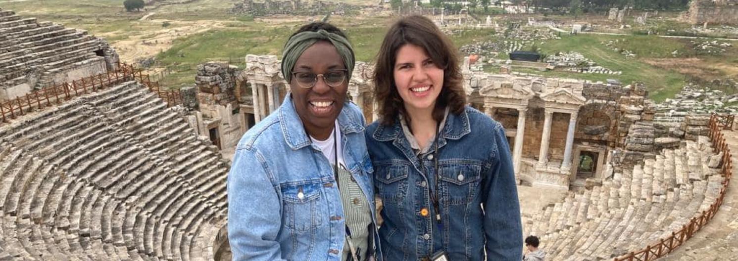 Two ladies standing on steps in Turkey