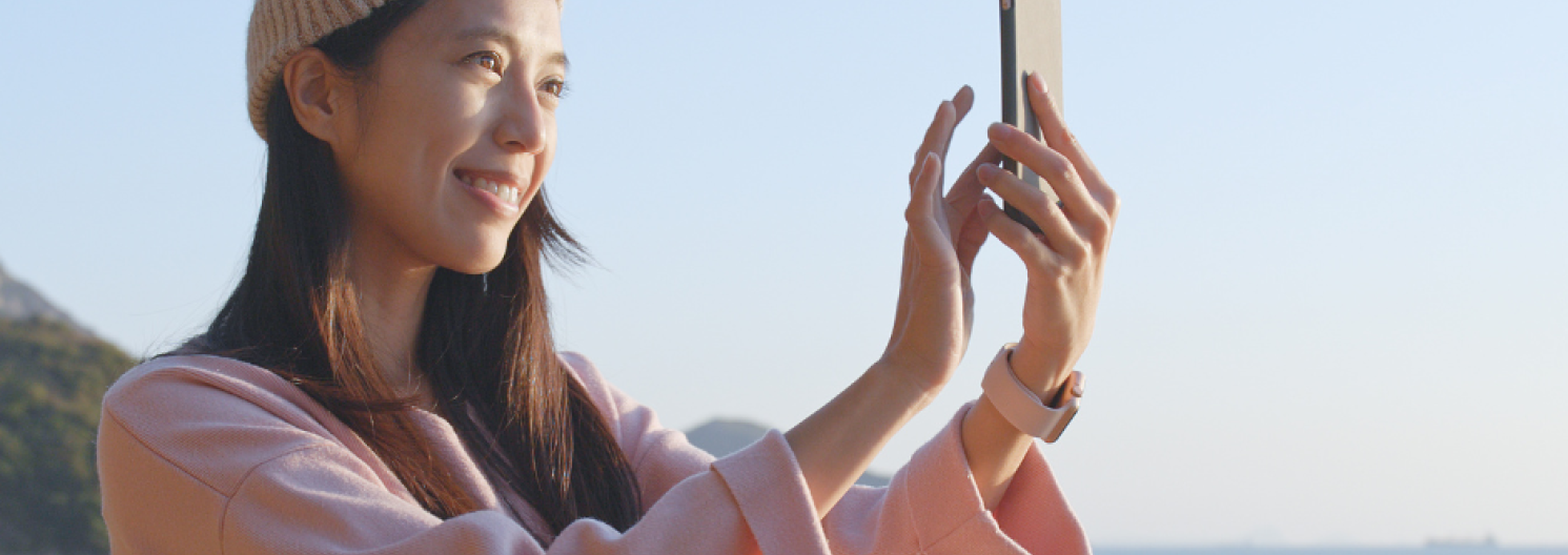 A woman looking at her phone