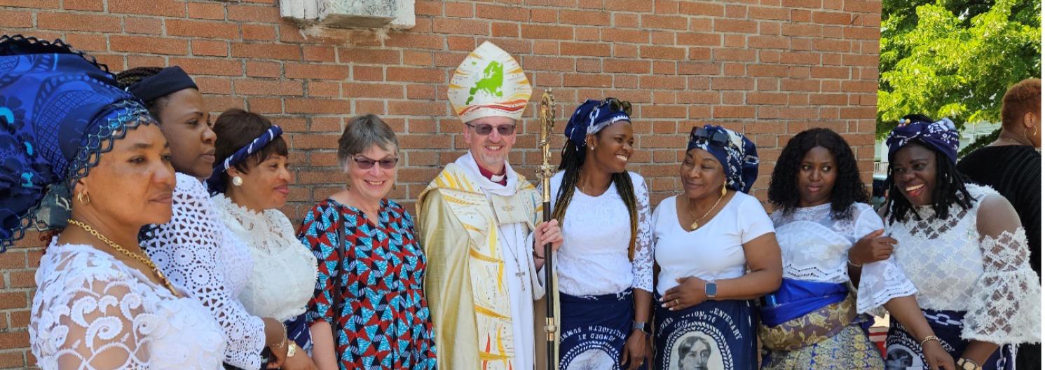 Bishop Robert and Mothers Union representatives in a row