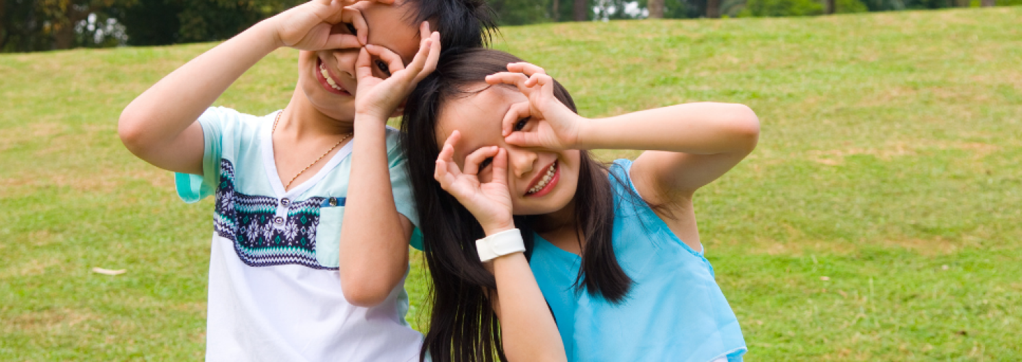 two children making faces