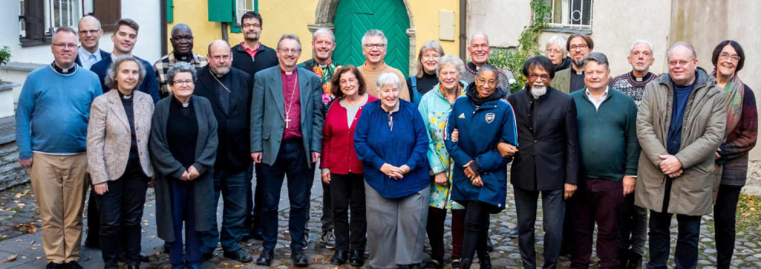 row of people archdeaconry synod tallin