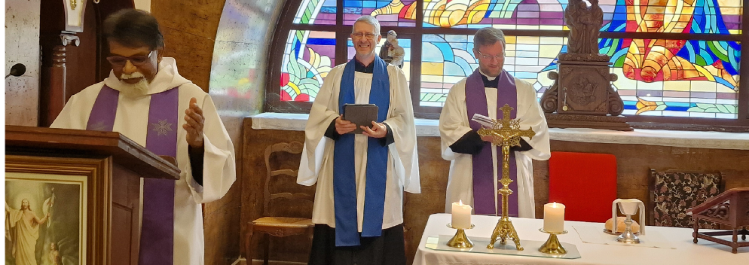 3 vicars front of church