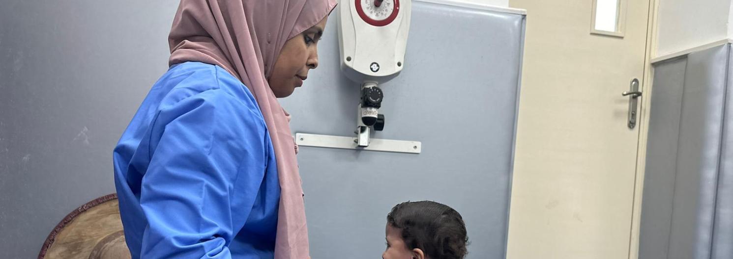 Nurse and small child