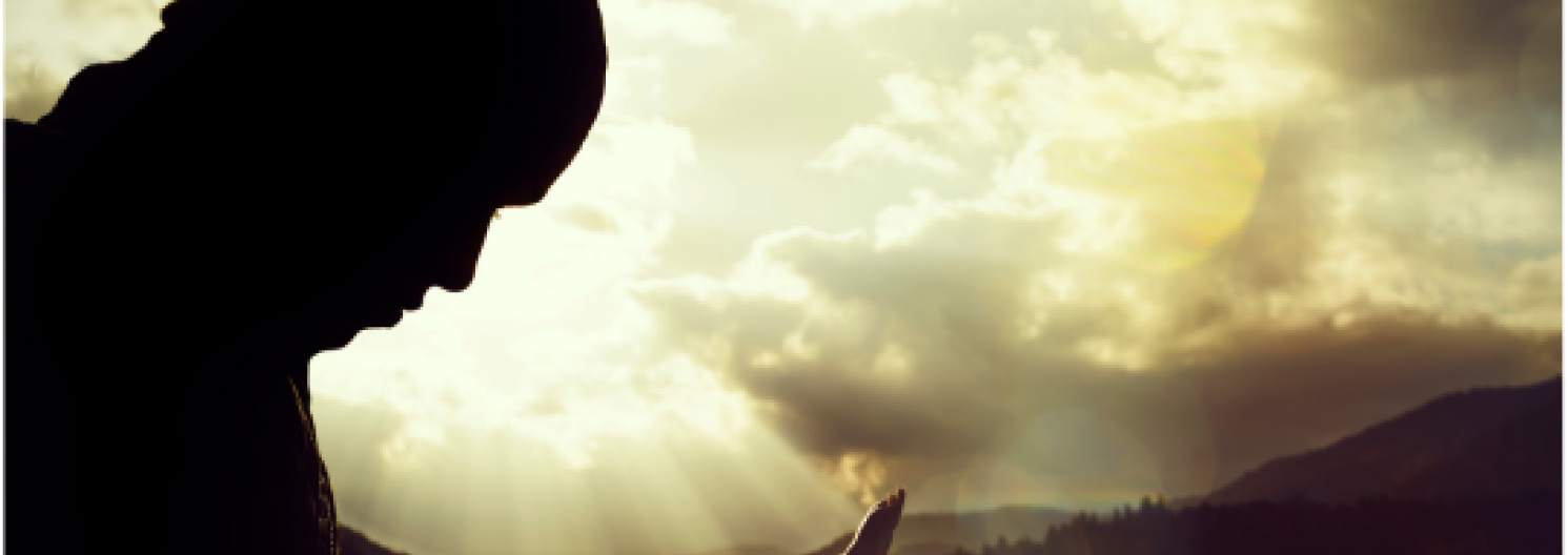 silhouette of a man praying against Sundays