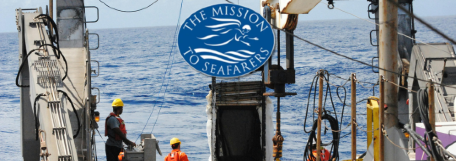 sailors on a ship with logo