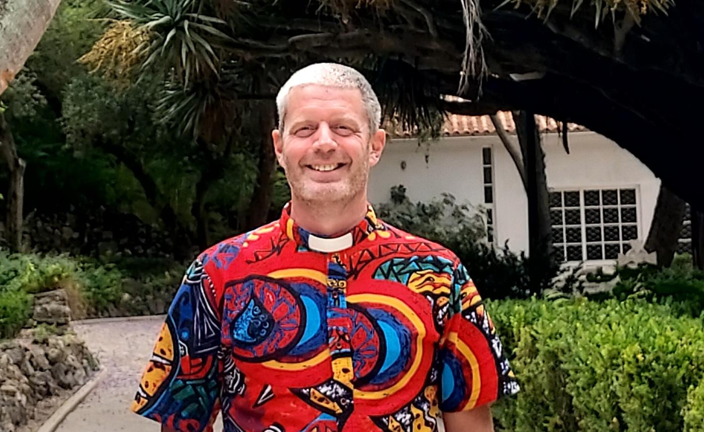 Ian in a bright shirt