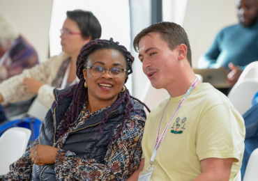 two young people talking