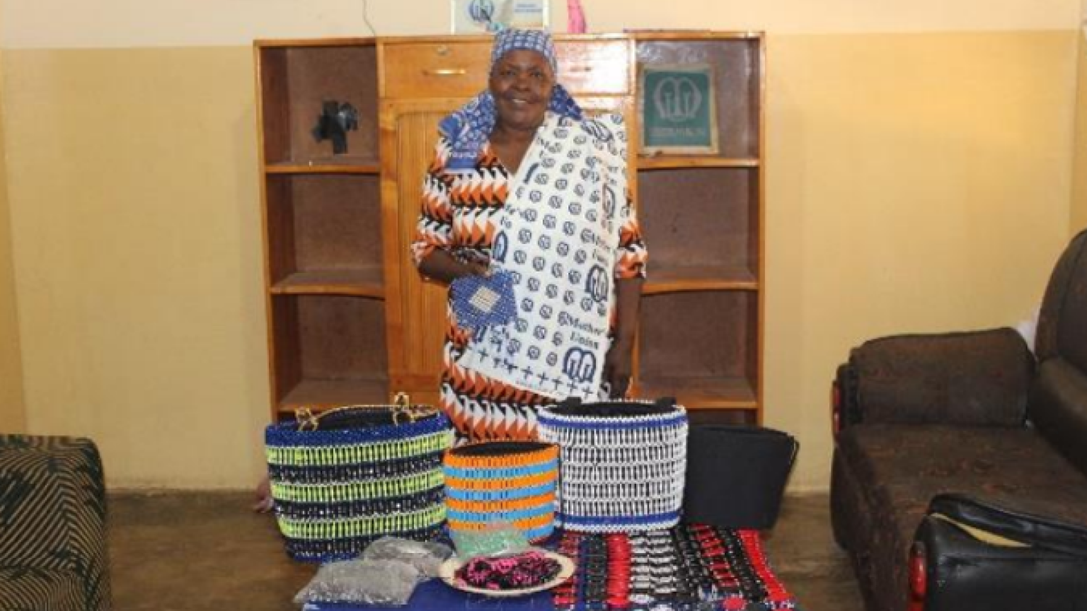 A tanzanian woman in colourful dress.